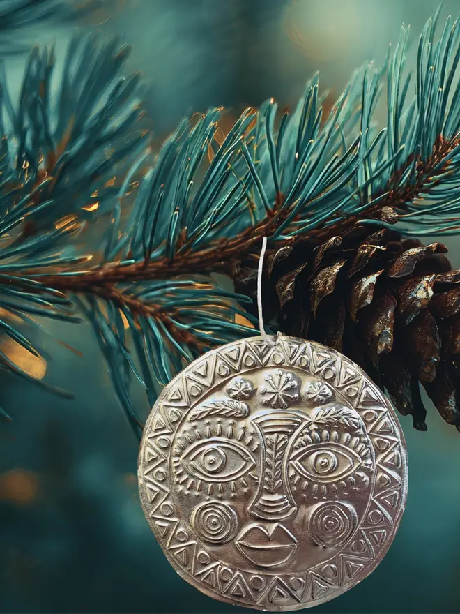 sun hand embossed tin decoration