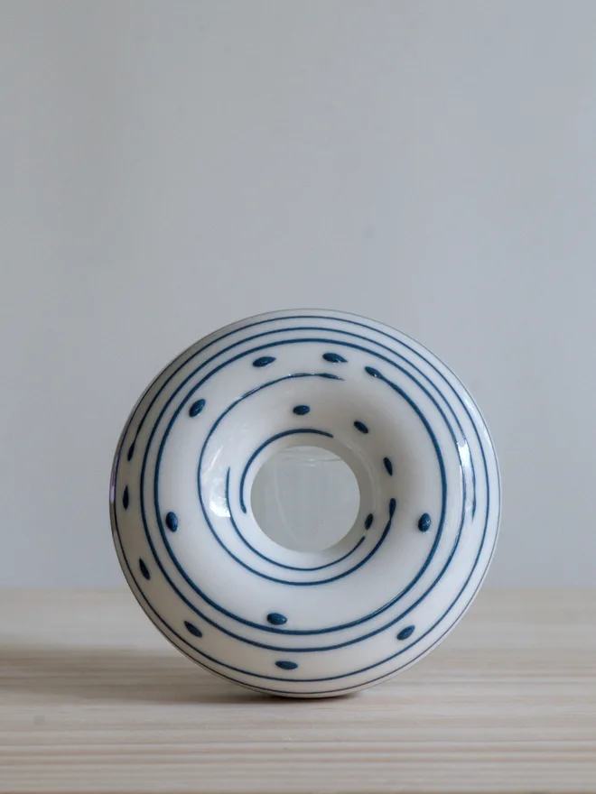 Avocado Planter White & Blue Handmade porcelain avocado planter with carved blue pattern, designed to hold an avocado seed for sprouting