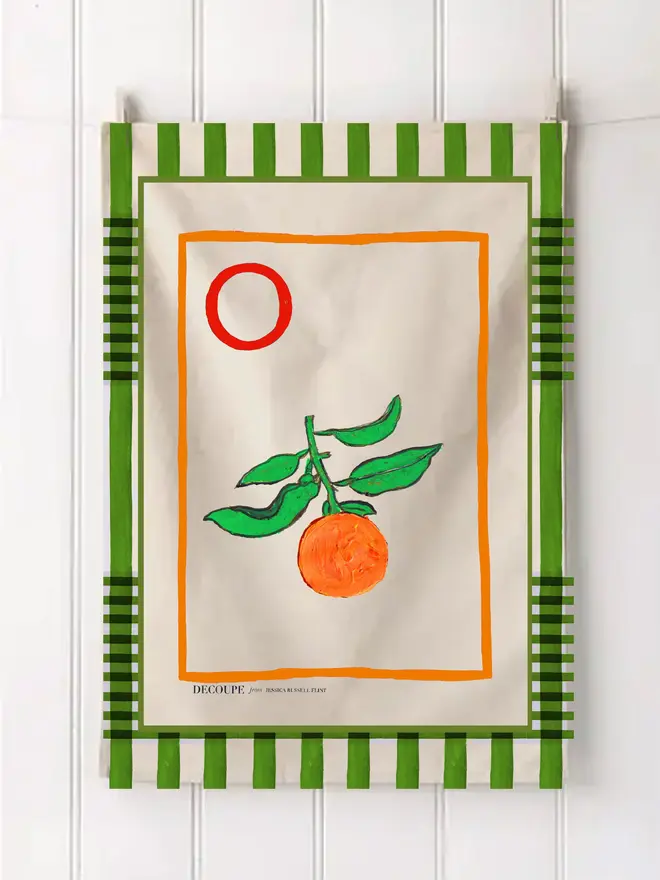 a-z alphabet tea towel. a tea towel with an orange print and the letter 'o' in the corner.