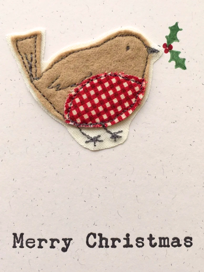 Freehand embroidered Robin with hand painted Holly on a hand printed Christmas card