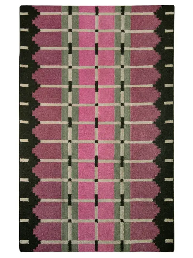 Corbie Flatweave Rug, a colourful rug sitting on a white plain surface. 