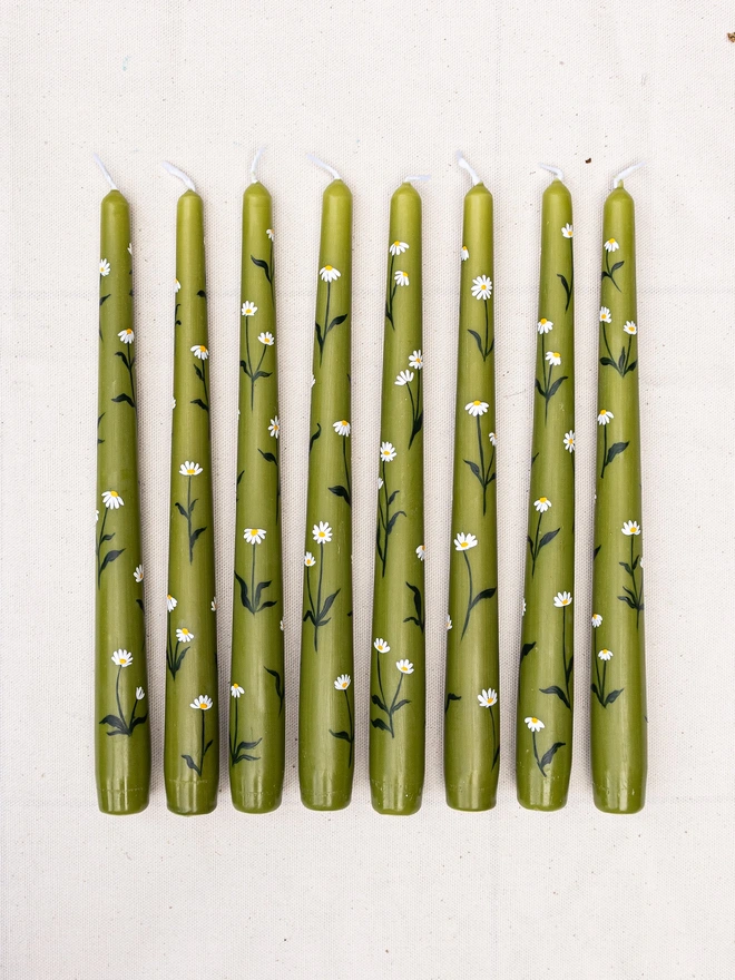 Hand painted olive green taper candles with daisy stems