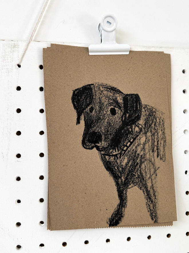 drawing of dog on brown paper 