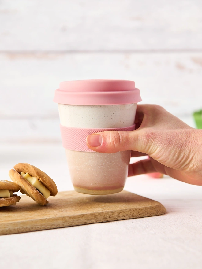 pink ceramic travel mug