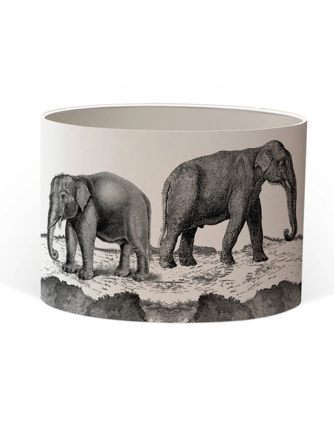 Handmade lampshade featuring adorable mischievous baby elephants playing together, inspired by Whipsnade Zoo, with a playful animal design.