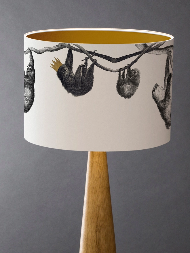 Drum Lampshade featuring Sloths on a wooden base 