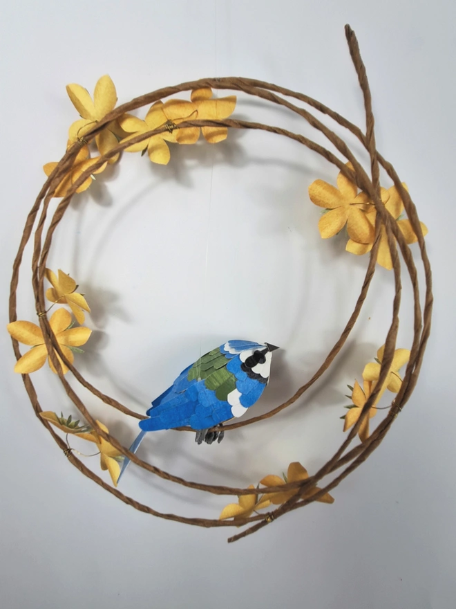 back view of a handmade blue tit sculpture