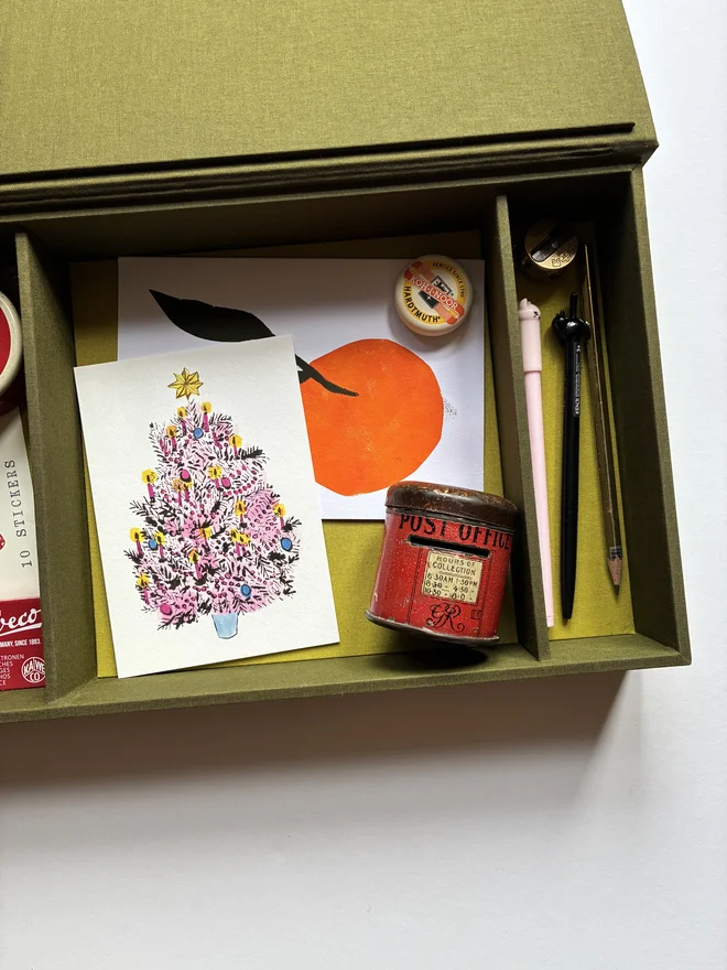 Open handmade Christmas Correspondence box in Olive green cloth displaying cards and stationery items