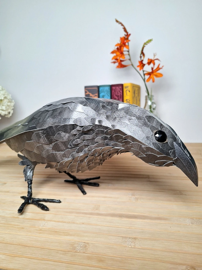 handmade bird sculpture of a raven