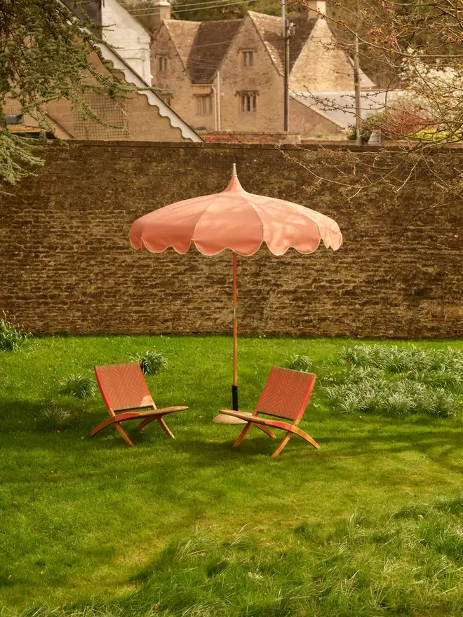 Burnt coral lounge chairs outside