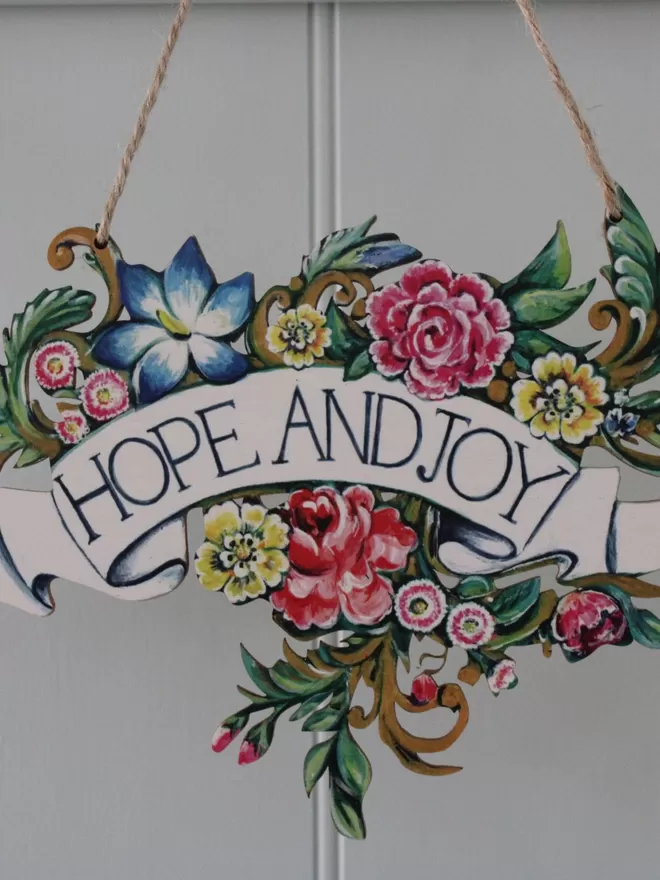 Wooden Banner saying 'Hope And Joy'