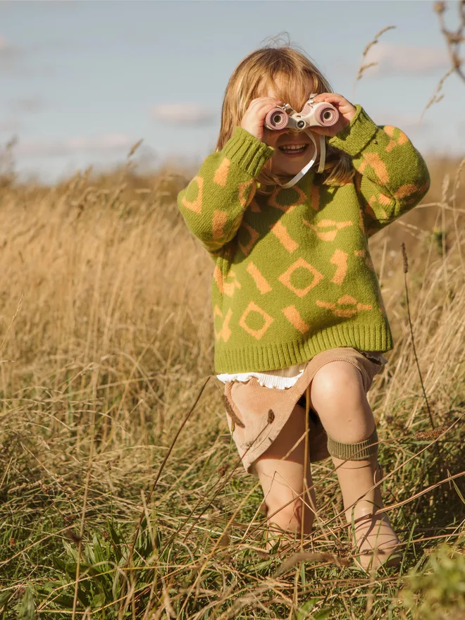 Kids wool jumper girl exploring