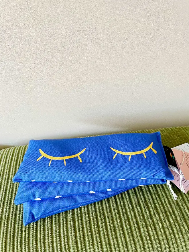 Original classic design blue eyebag with yellow sleepy eyes.
