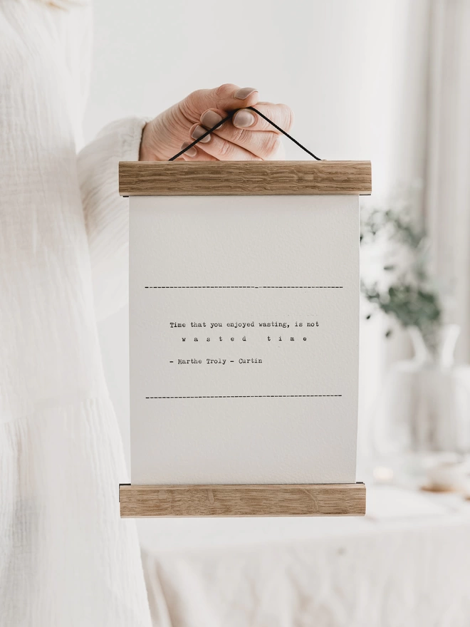 Personalised typed quote in a wooden print hanger