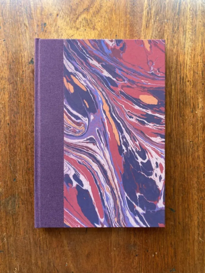 A5 Plain Journal. A closed purple journal.
