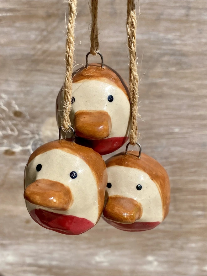 ceramic robin hanging decoration - group - close up