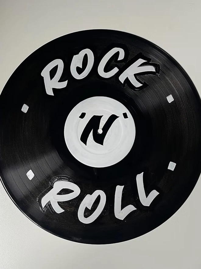 'Rock 'N' Roll' 12" Vinyl Artwork, a colourful artwork sitting on a plain surface. 
