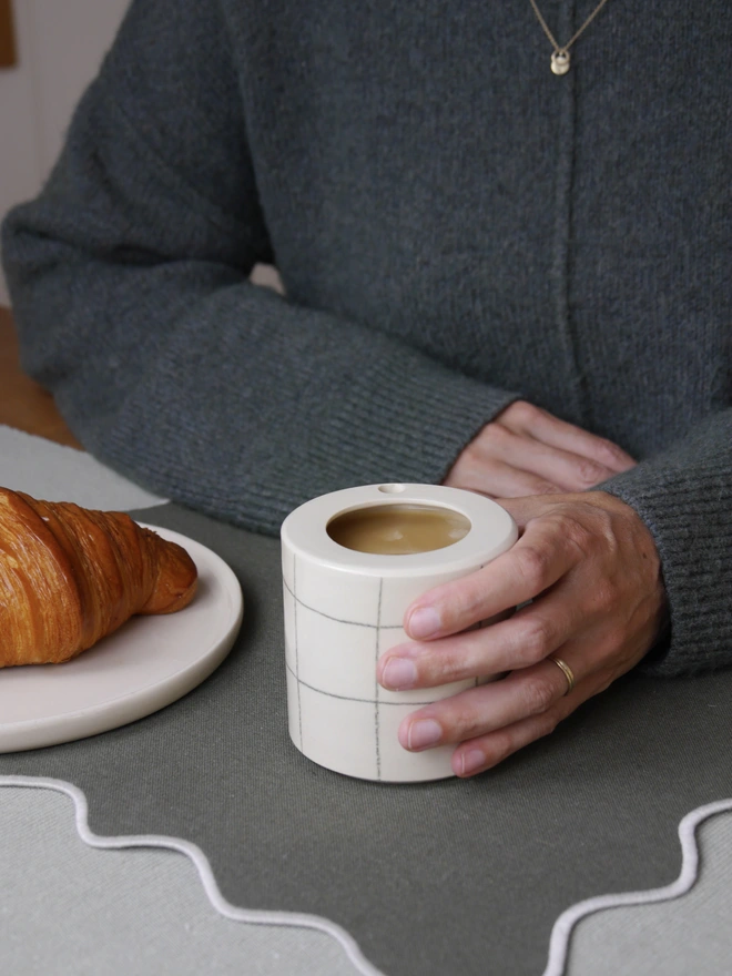 handmade ceramic to-go coffee cup
