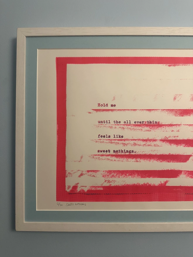 pink screenprint with blue mount in white frame