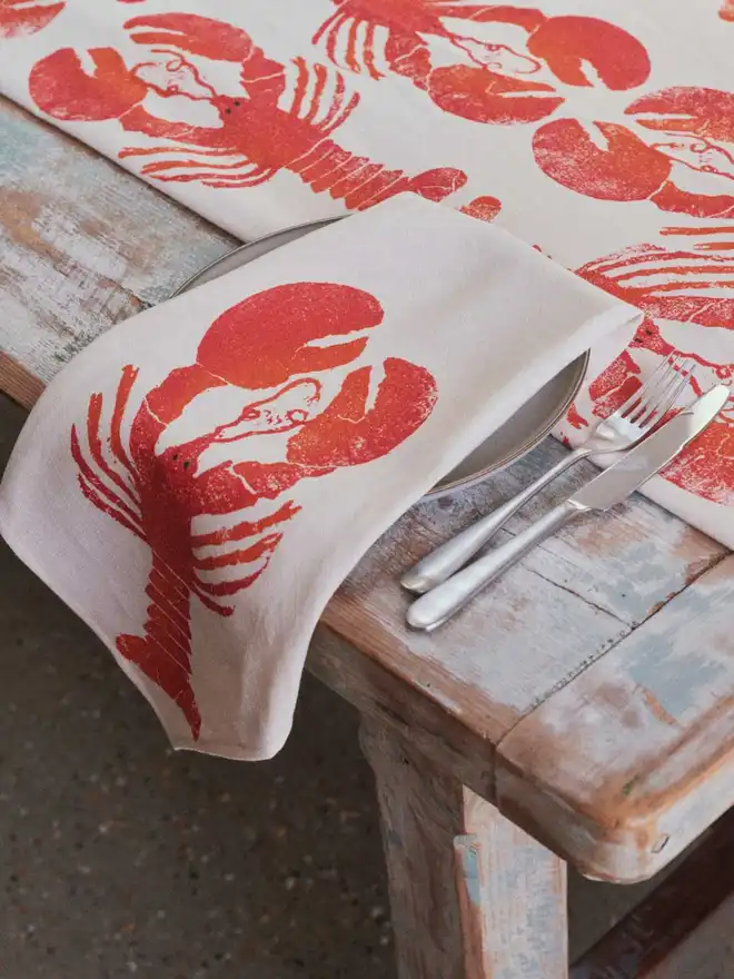 lobster orange and red napkin and runner 