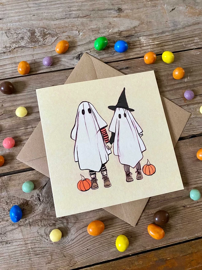 illustrated halloween card featuring 2 ghosts