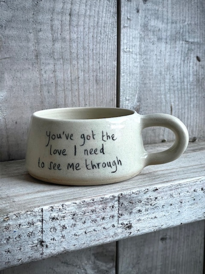 Cream ceramic mug with the words 'You've got the love I need' written on it 