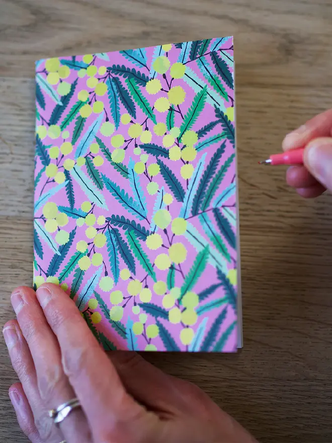 pink mimosa flower illustrated notebook