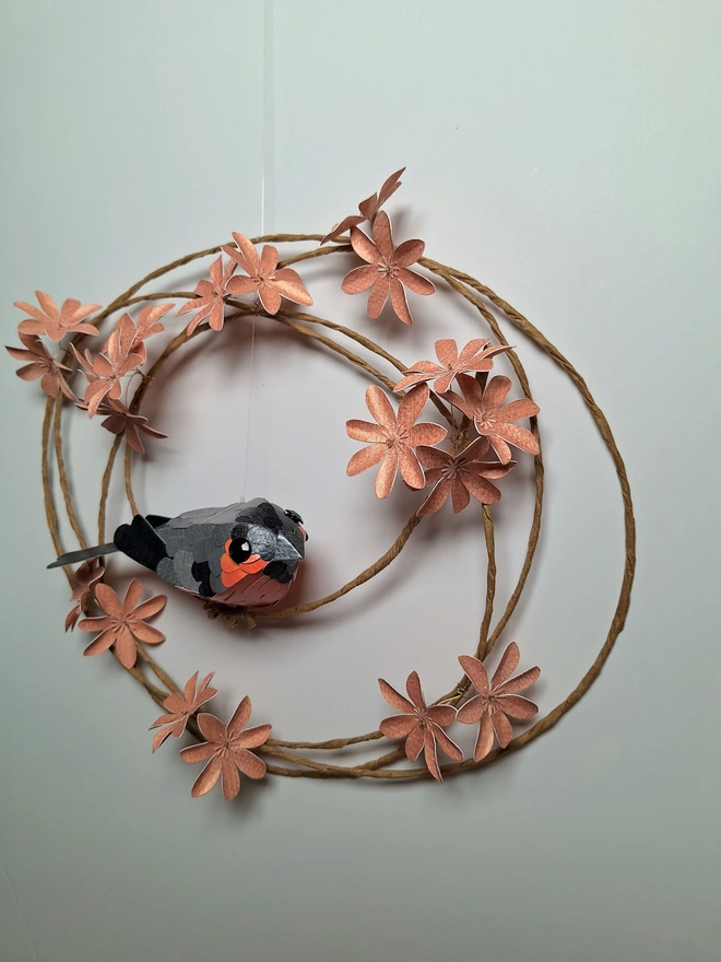floral wall art featuring a bullfinch