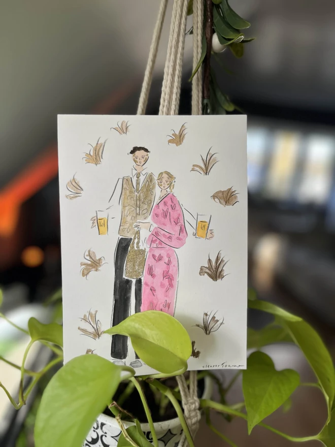 A hand-painted A5-sized personalised portrait of two people by Eleanor Joanna, illustrated in a whimsical style. The background is fully customisable to reflect the buyer's preferences, making it a unique and tailored piece of art.