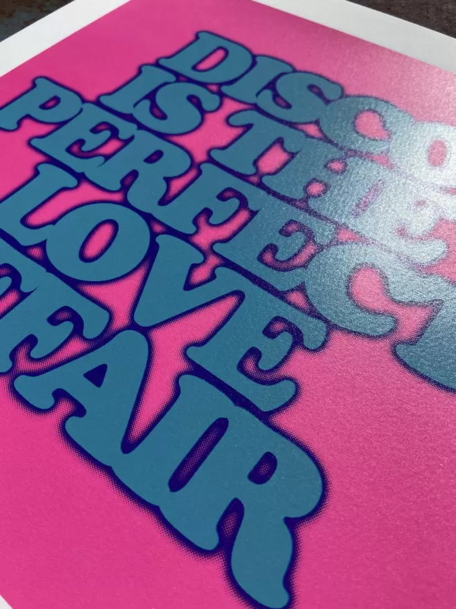 "Disco Is The Perfect Love Affair" Mini Screen Print with pink background and the words disco is the perfect love affair printed on top in blue 