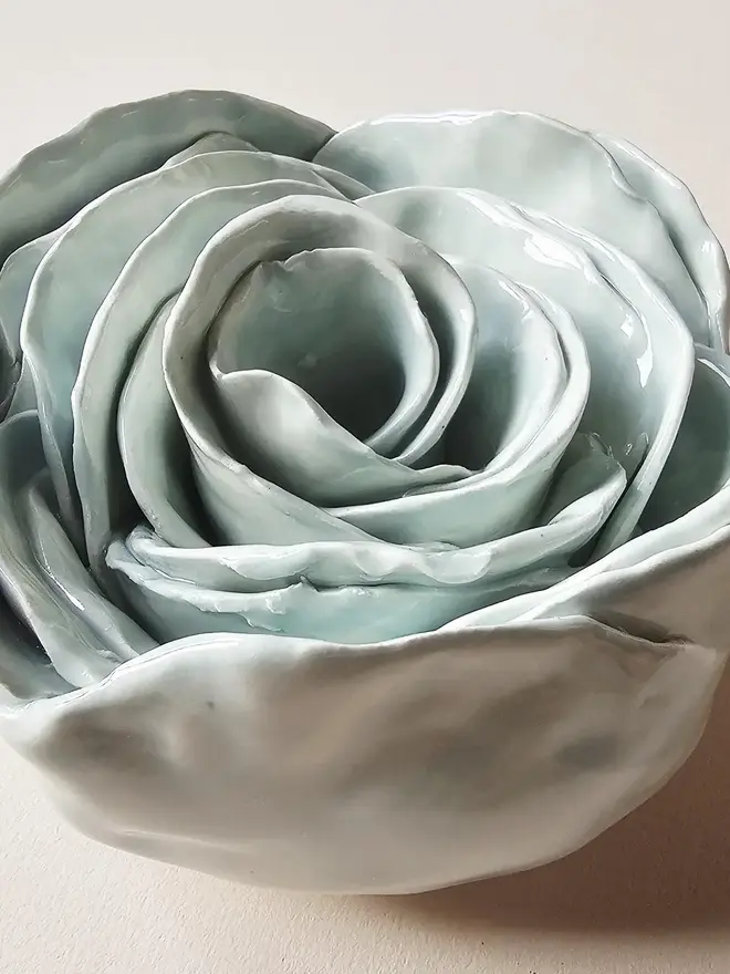 light blue glazed handmade ceramic roses