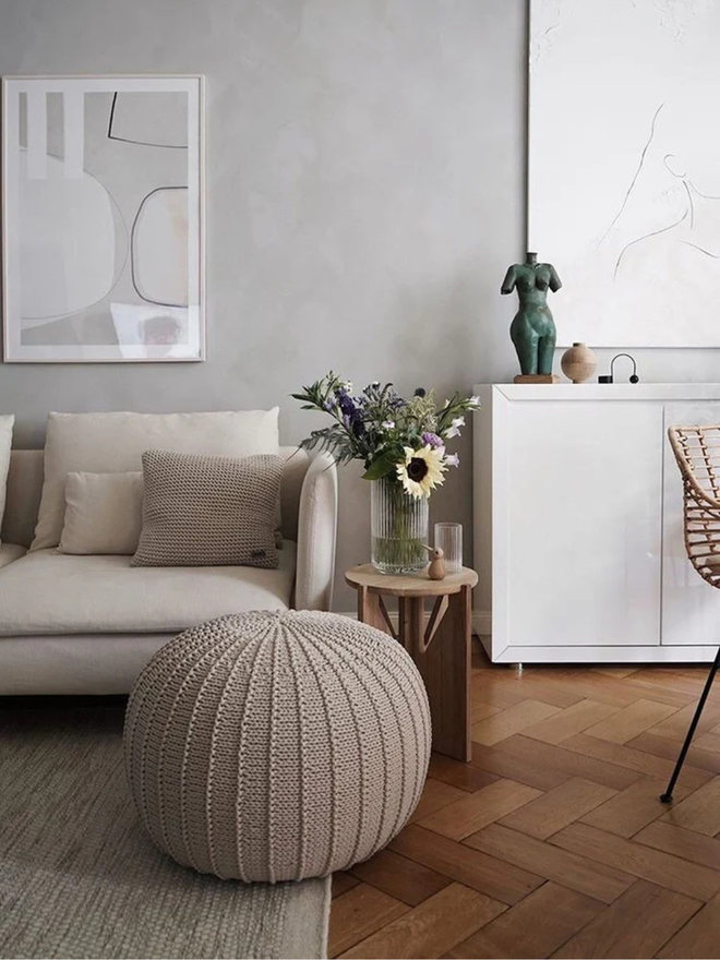 Zuri House. Large beige knitted pouffe.