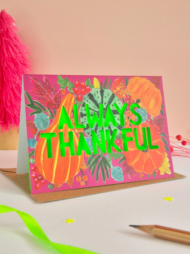 Pumpkin Thanksgiving card with Always Thankful paper cut text and neon green backing paper 