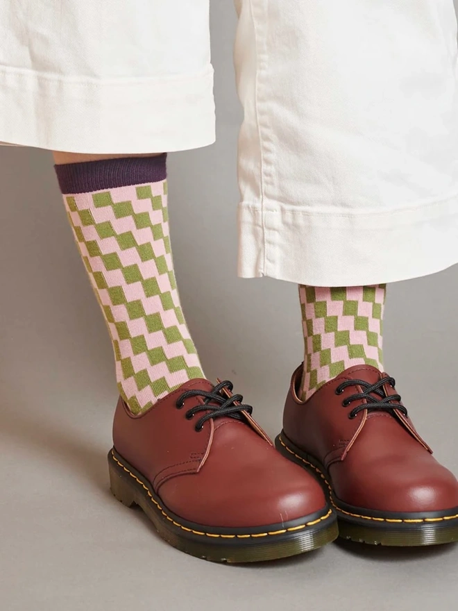 Women's Check Organic Cotten Ankle Socks, a woman wearing a pair of colourful patterned socks. 