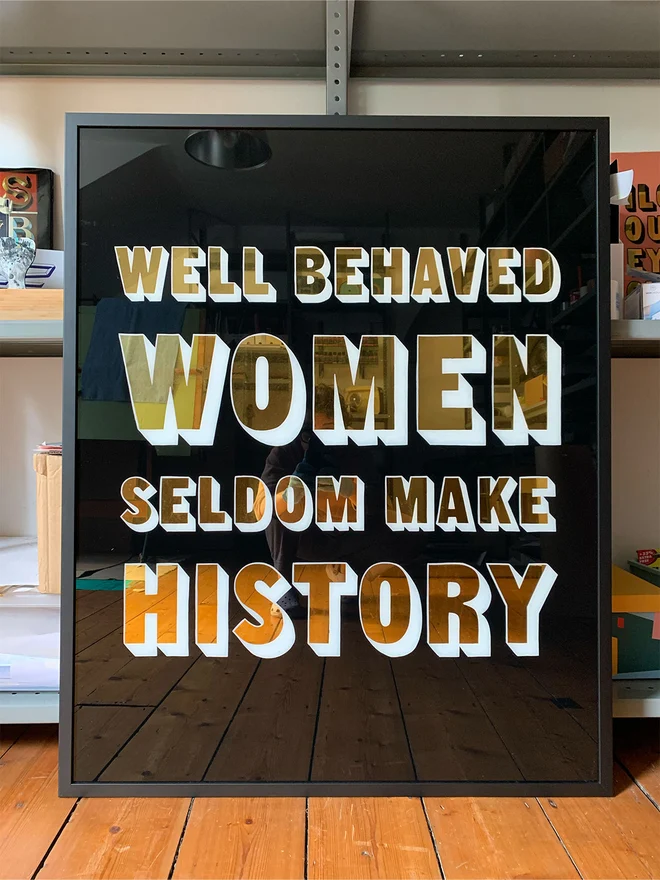 well behaved women seldom make history gold sign