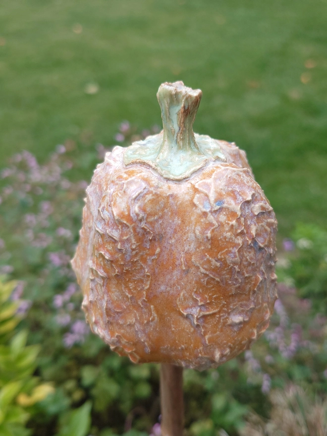 Stoneware pumpkin can topper