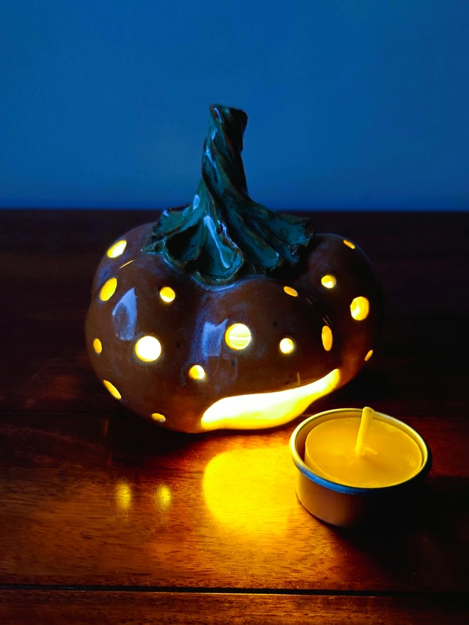 Pumpkin candle holder