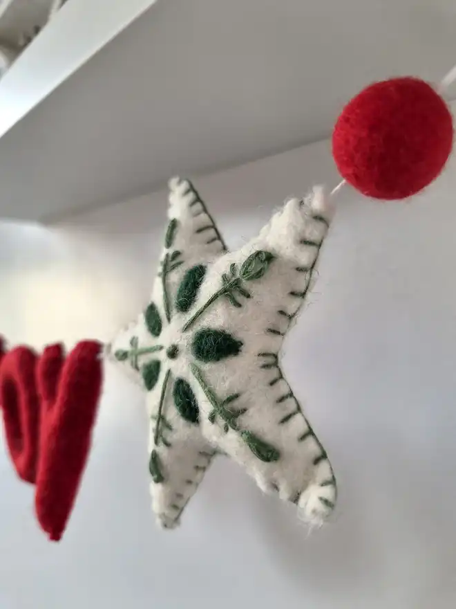 Felt embroidered white and green Christmas star