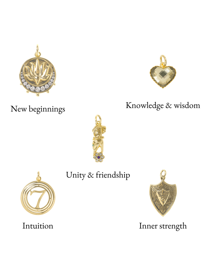 Gold charms on a white background