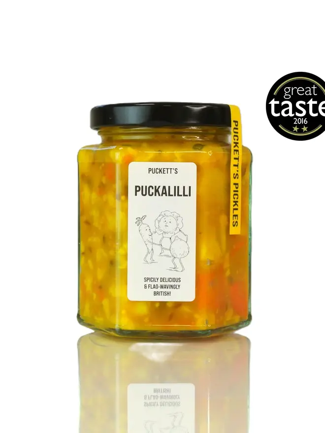 puckalilli piccalilli. a jar of piccalilli photographed on a white background. 