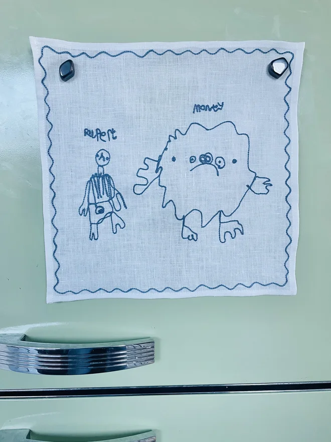 child's artwork drawing embroidered onto linen handkerchief dusty blue thread