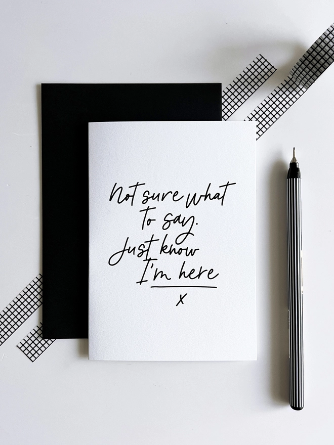 Minimal black and white sympathy card with handwritten text “Not sure what to say. Just know I’m here.”