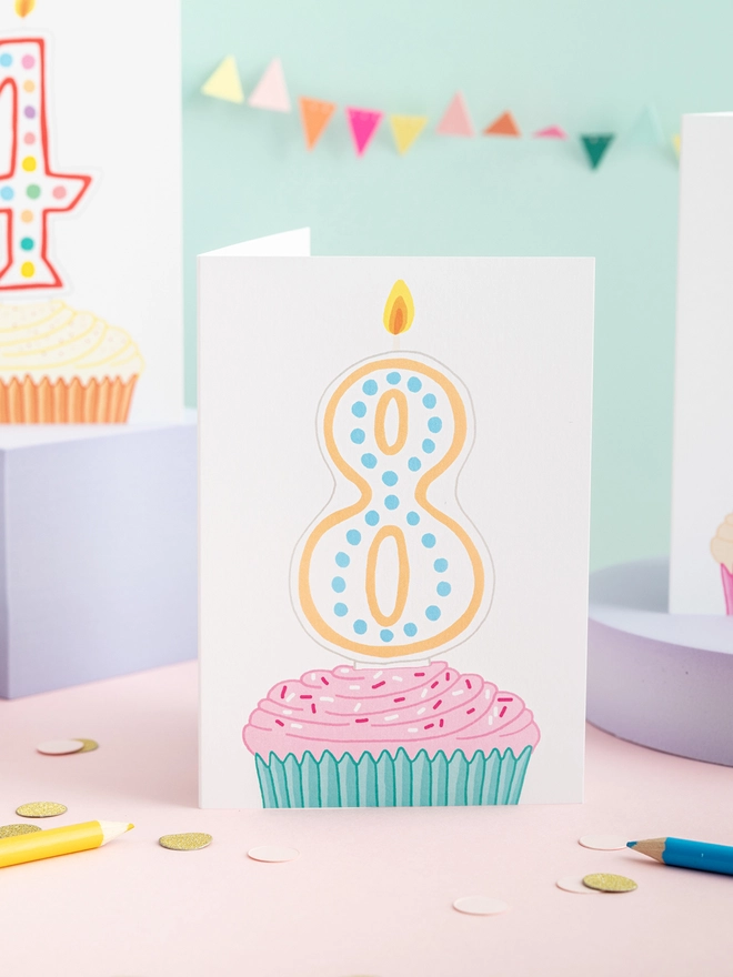 A sweet eighth birthday card featuring a cupcake and candle