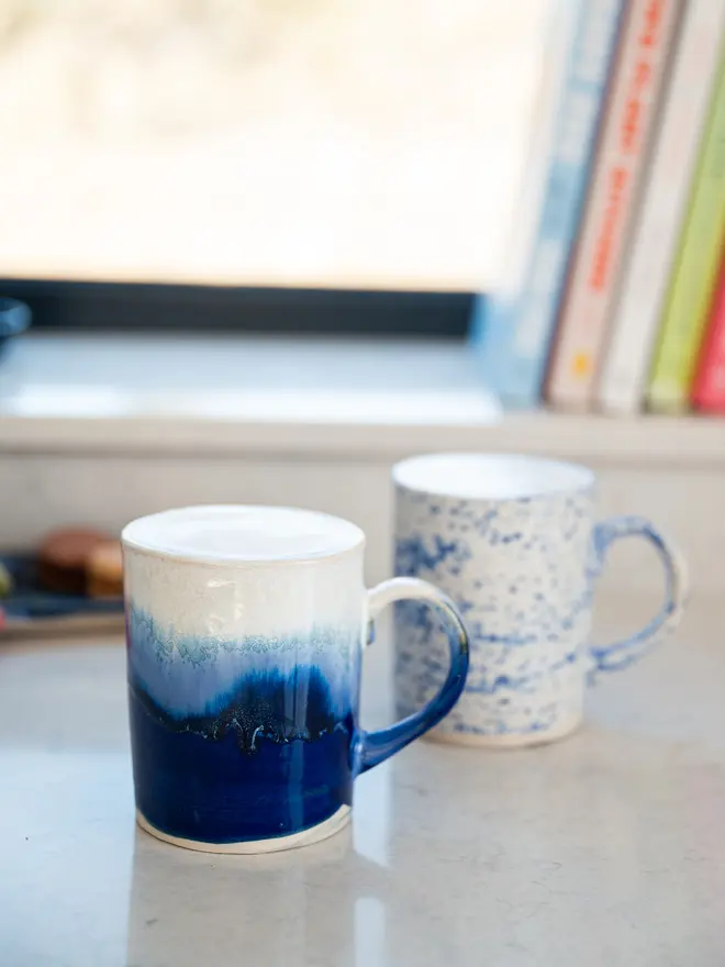 lulworth cove ceramic glazed mug, jenny hopps pottery, blue and white ceramic mug