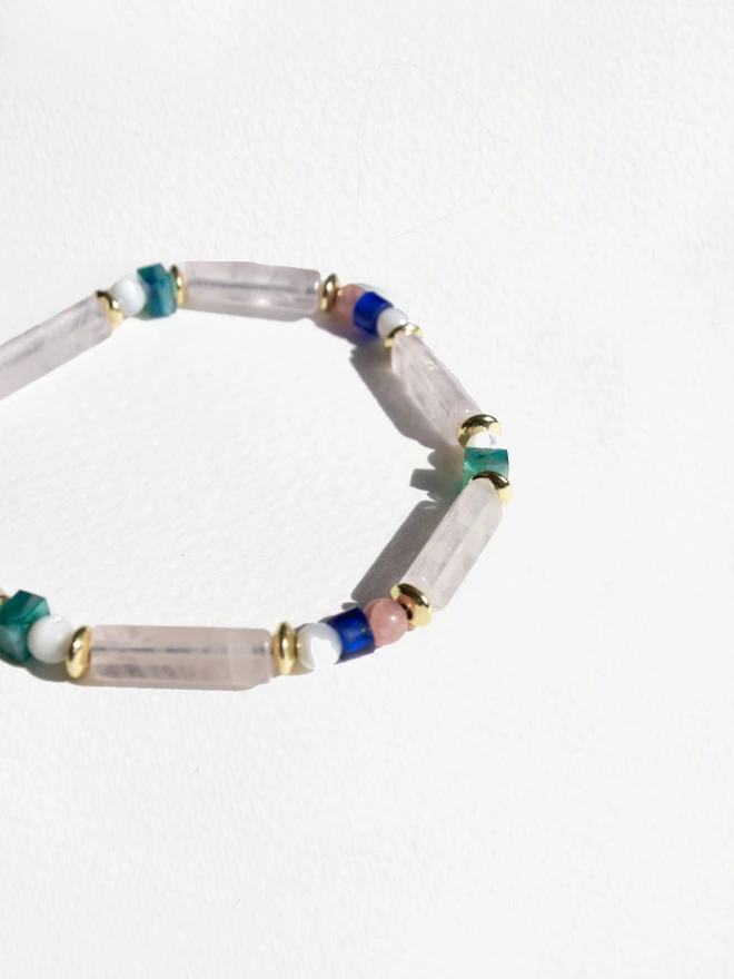 Beaded bracelet with natural beads on a white background