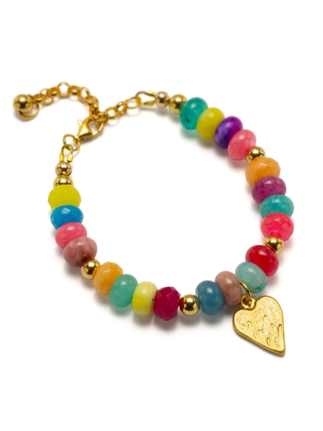 Candy girl beaded necklace with gemstones. A multicoloured gemstone beaded necklace shown worn with a heart charm