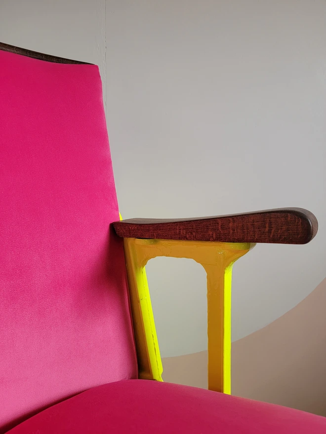 Hot pink velvet cinema seat - angle close up with seat down