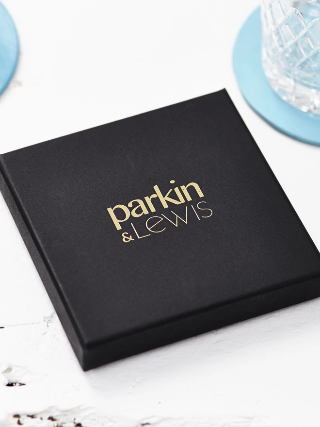 mini message personalised valentines leather coaster. a black square gift box with parkin & lewis brand name on top.