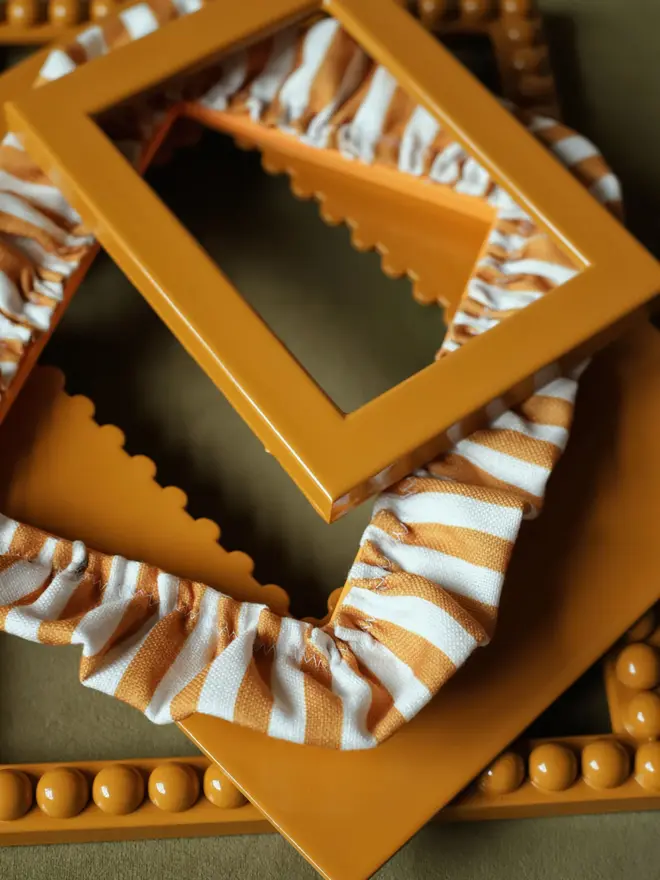 mustard lacquered frame