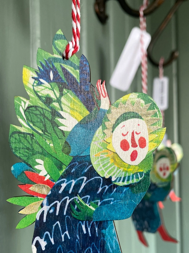 Esther Kent Snging Angel blue, red and green hanging angel decoration laser cut from wood